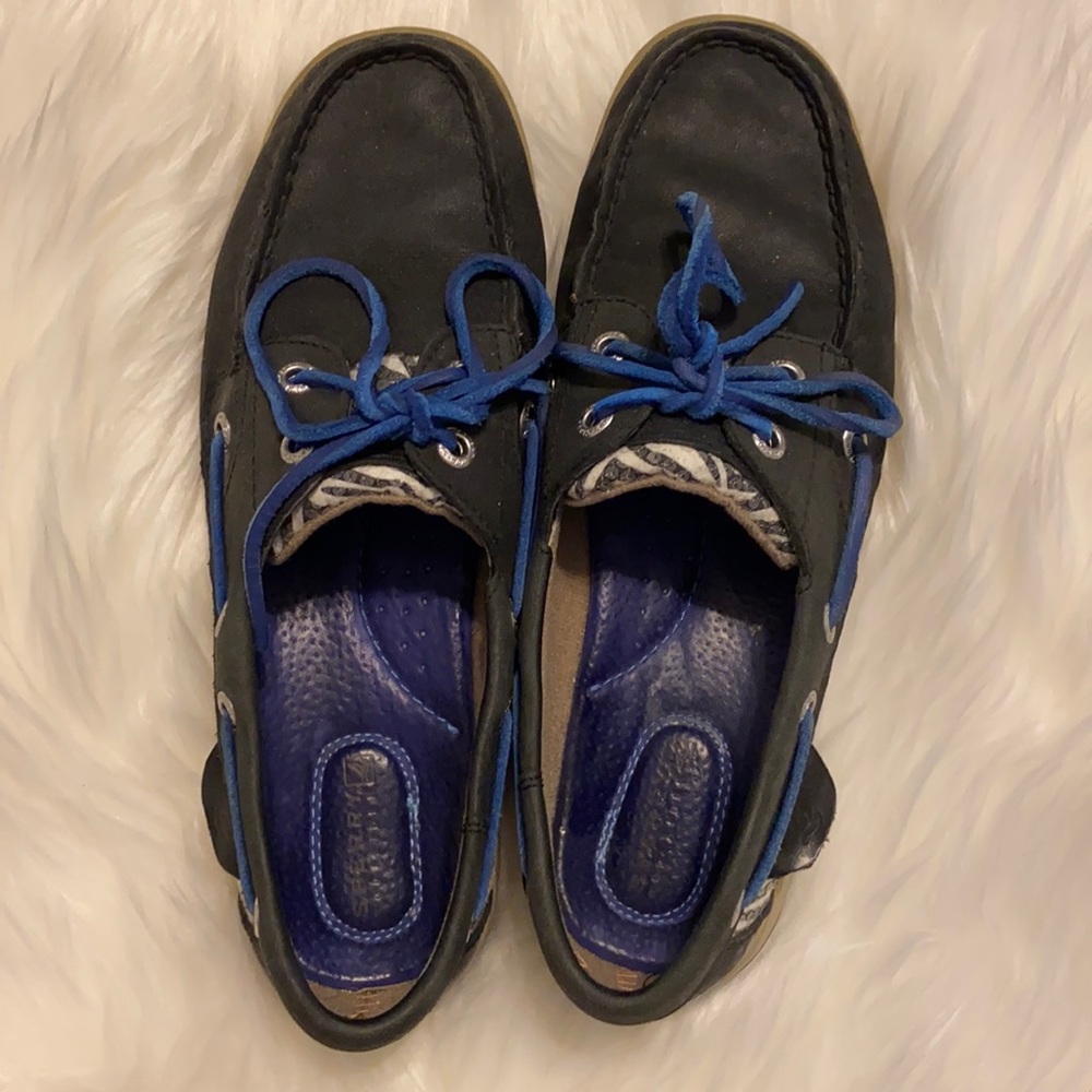 Women’s navy, zebra stripe, Sperry Topsiders.